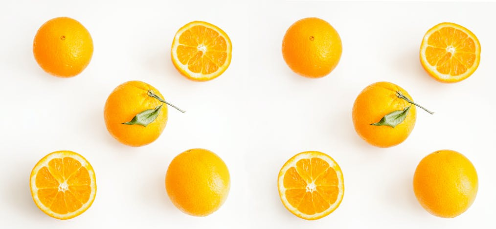 photo of sliced orange citrus fruits